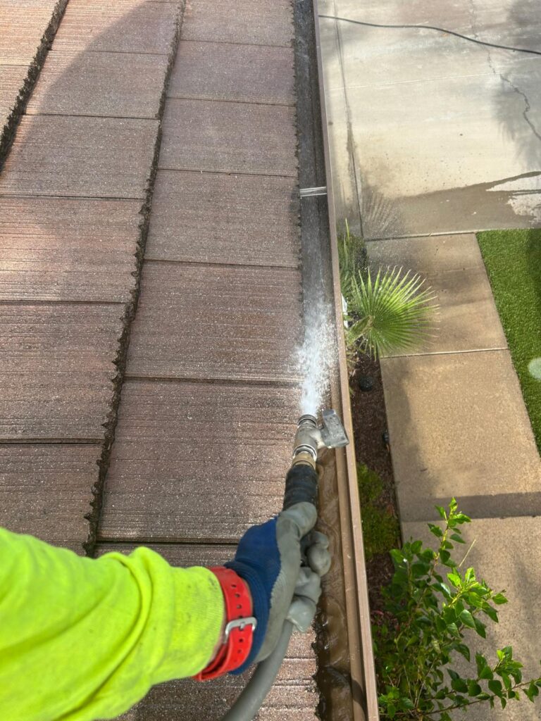 Flushing the gutter clean